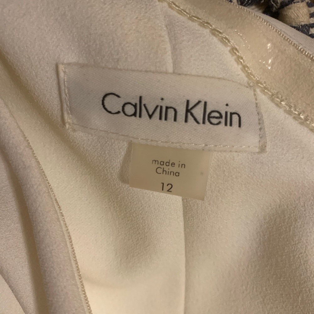 One shoulder white pantsuit with cape